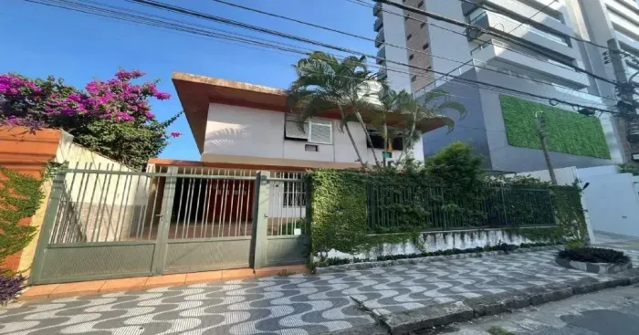 Casa 5 dormitórios para alugar, 250 m² por R$ 9.770/mês - Ponta da Praia - Santos/SP