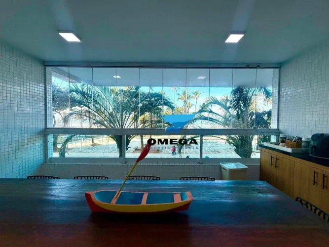 Apartamento reformado frente mar à venda na praia das Pitangueiras no Guarujá I Omega Imov