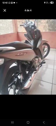 Biz 125, flex em dias quitada.