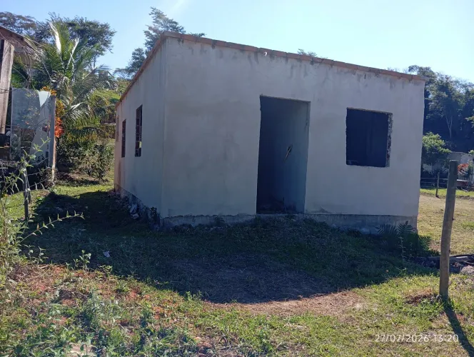 Vendo terreno com construção