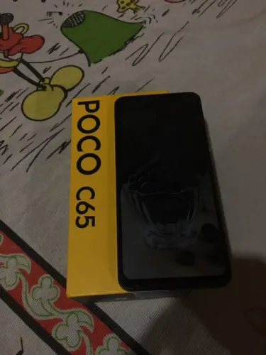 Vendo celular poco c65 novo nunca mexido com nota fiscal 128gb