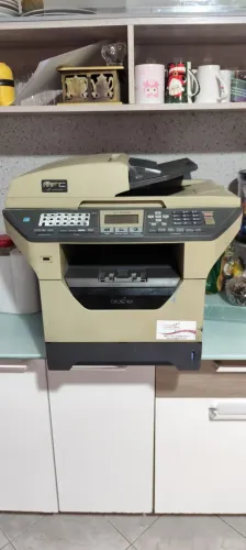 Impressora Brother MCF 8890 a laser preto e branco funcionando