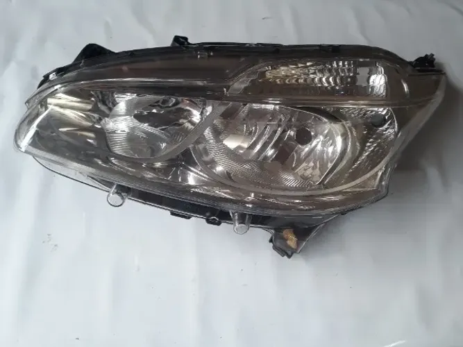 Peugeot 208 - Farol esquerdo original Valeo.