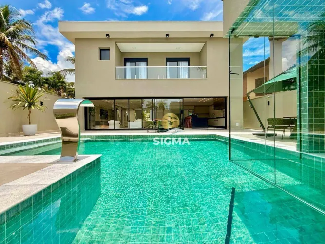 Casa com 6 Suítes à venda no Condomínio Jardim Acapulco - Guarujá/SP.