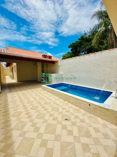 casa nova a 50 metros do mar com piscina