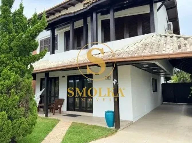 Casas em condomínio à venda com 5 dormitórios, 3 vagas de garagem, no Campeche, Florianópo