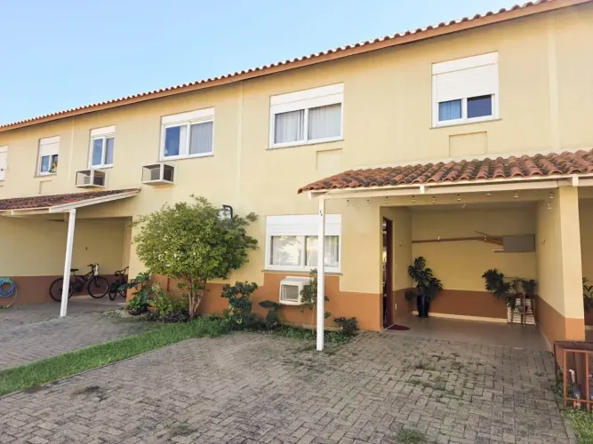 Sobrado para aluguel tem 110 metros quadrados com 3 quartos em Harmonia - Canoas - RS