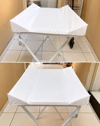 Trocador e suporte de banheira