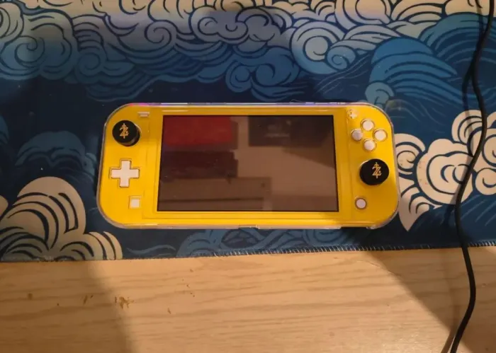 Nintendo Switch Lite Desbloq. | +SD 128GB, carregador, case e capinha protetora inclusos