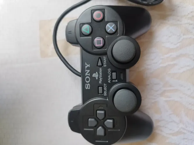Controle de PS2 original novo.