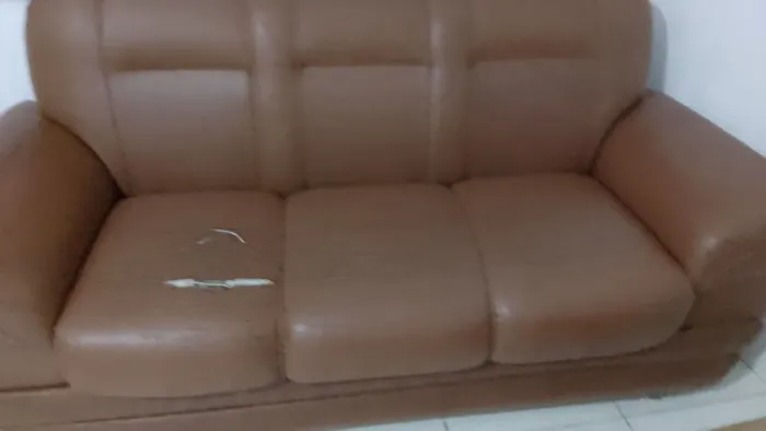 Sofá de três lugares