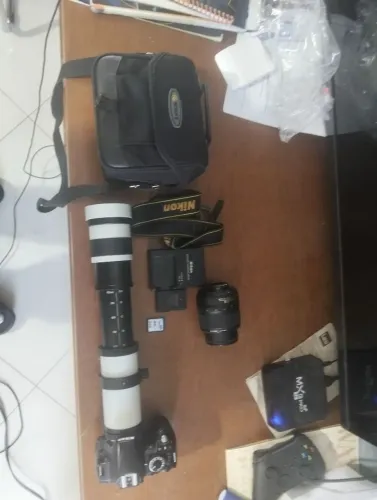 NIKON D3100 ZERADA COM LENTE 450 800 MM