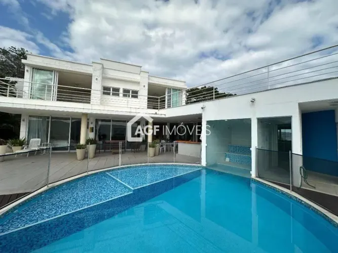 Casa em condomínio com 4 suítes à venda, 420 m² por R$ 3.480.000 - Camboinhas - Niterói/RJ