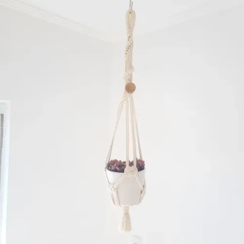 Suporte para plantas em macramé