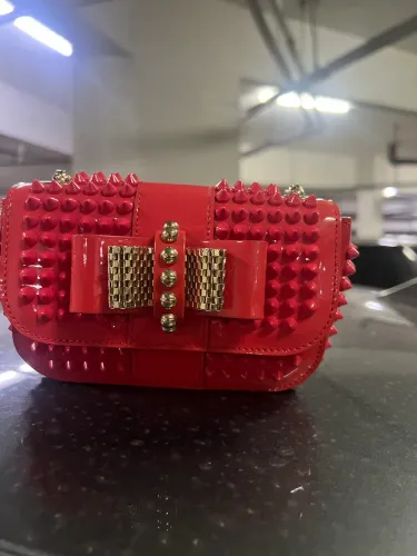 Christian Louboutin bolso cruzado rosa Sweet Charity