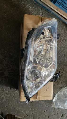 Farol Hilux SW4 original novo