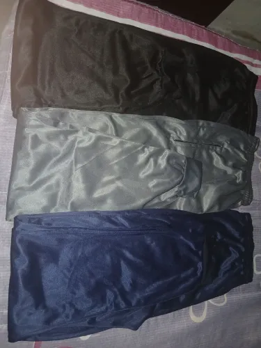 Calça jogger feminina com zíper ,na cor azul , cinza e preto, tamanho g