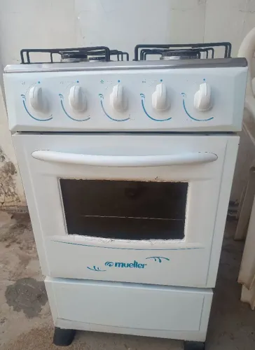 Fogão usado acendendo manual