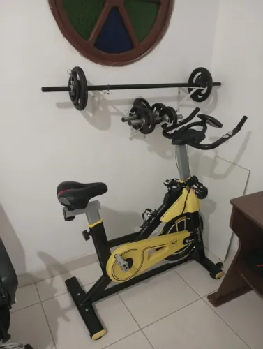 Bicicleta ergométrica mais peso