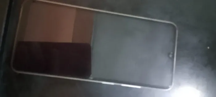 Vendo um célula  redimi A5 128 gigas novo sem nenhum aranhão 800 reais 