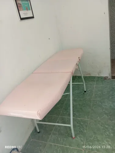 Maca rosa com escada, lençol e ficha anamnese