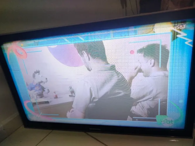 Vendo tv com defeito na imagem 