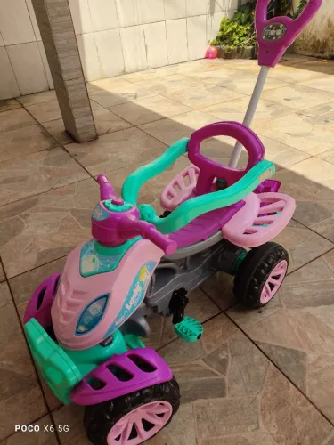 Trator infantil feminino
