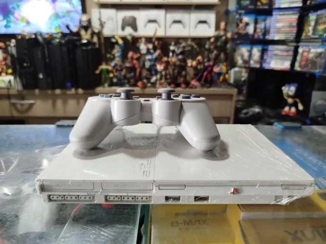 Playstation 2 slim série especial cores branco ,prata e vermelho ac trocas...