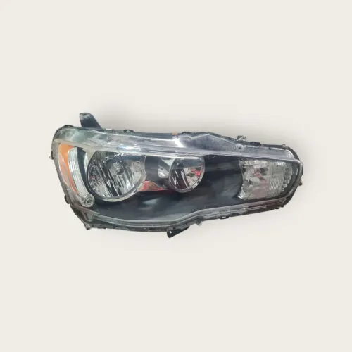 Farol mitsubishi lancer 11/19 Dir: