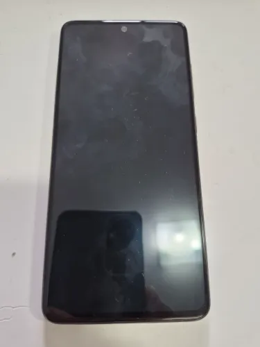 VENDO CELULAR A 51 - PRATICAMENTE NOVO.