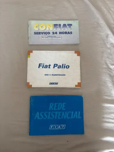 Oferta especial: Manuais originais do Fiat Palio 2001, com detalhes sobre Assistência 24h.