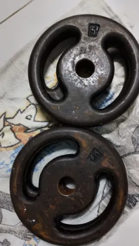 Vende_ se 1 par de anilhas de 5 kilos, ferro fundido