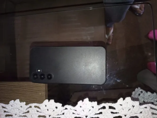 Celular a25 5g 256gb com película e capinha poucas mas poucas marca de uso