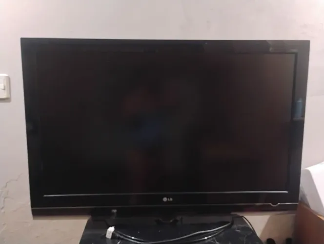 Tv usada LG em torno de 55 polegadas.