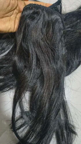 Cabelo brasileiro humano 55cm e uma tela de 45cm 180 gramas.