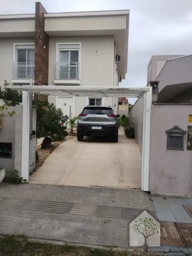 Casa à venda no Carianos com 3 dormitórios, 2 suítes e escritura pública