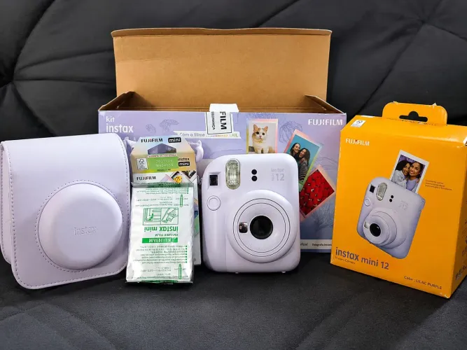 ? Câmera Instax Mini 12 Fujifilm Lilás + Bolsa + Filme | Nova, Nunca Usada