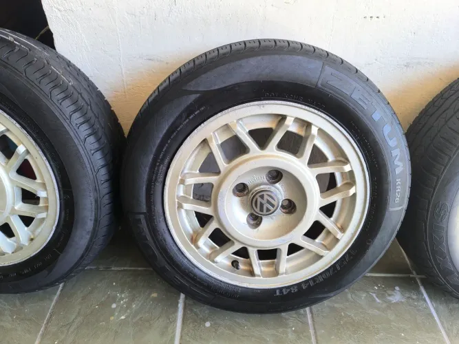 Rodas vw originais aro 14 gol gt snowflakes com pneus