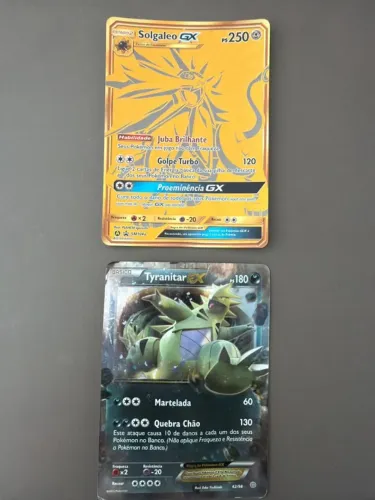 Lote 2 Cartas Pokémon Raras: Solgaleo GX Dourada + Tyranitar EX usadas no estado que esta