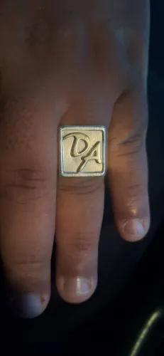 Vendo Deidera de prata com letras de ouro 