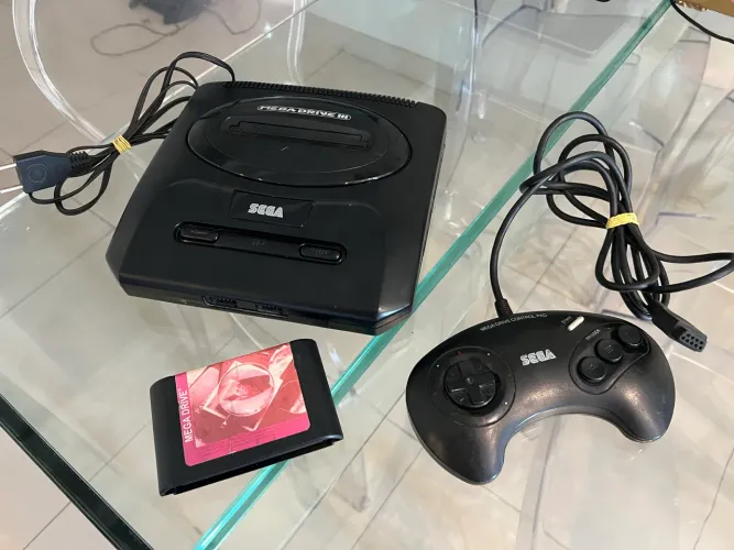 Mega drive super novo com controle americano e carmen san Diego