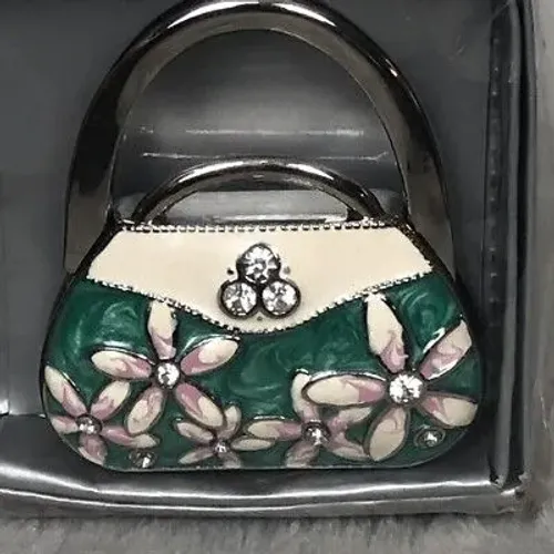 Cabide de bolsa design floral strass 