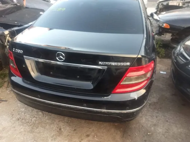 Tampa da mala parachoque traseiro Mercedes c 200 ano 2007 original 