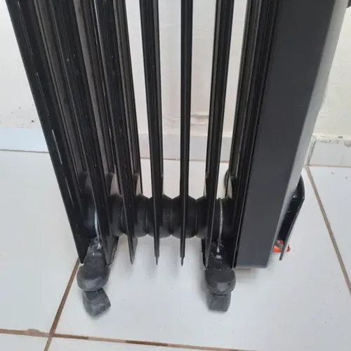 Aquecedor elétrico à óleo