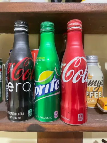 Coleção de Garrafas de Coca-Cola e Sprite