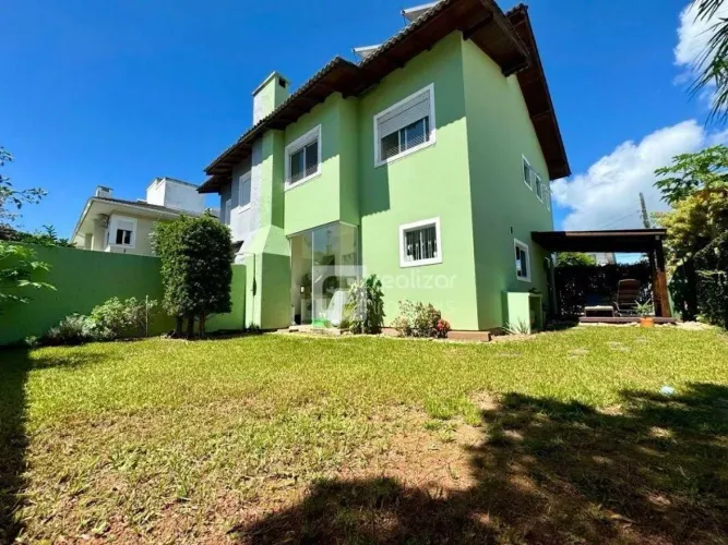 Casa com 3 dormitórios à venda, 226 m² por R$ 1.390.000,00 - Campeche - Florianópolis/SC