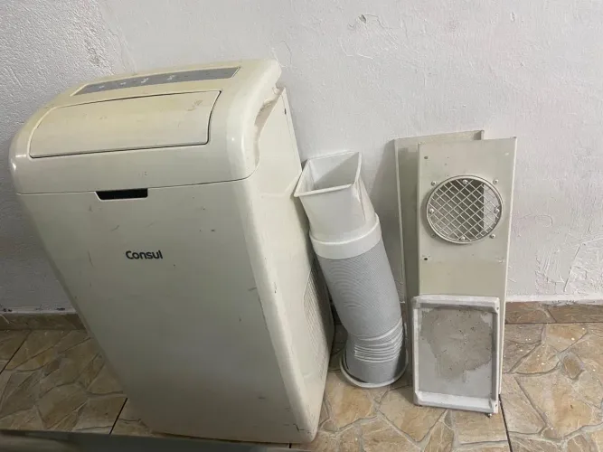Ar condicionado portátil 110 v (usado) 1.200K