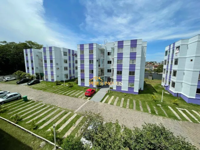 Apartamento com 2 dormitórios à venda, 60 m² por R$ 164.000 - Maria Turri - Rio das Ostras