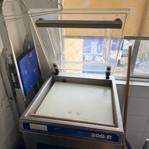 Máquina industrial de embalar a vácuo