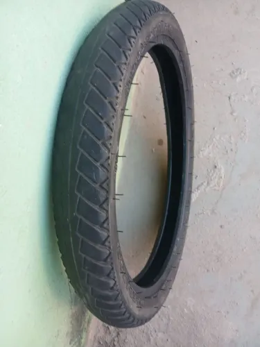 Vendo um pneu meia vida quebra galho 50 reais pra moto 125 número 18